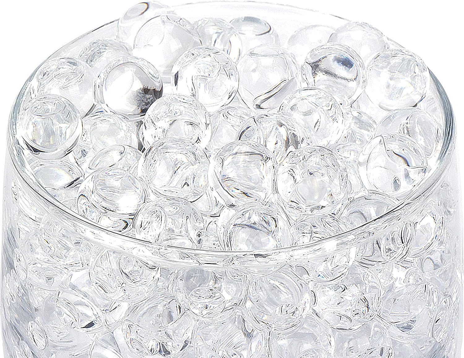 BYMORE 60000 clear water gel beads in a bowl on a white background.